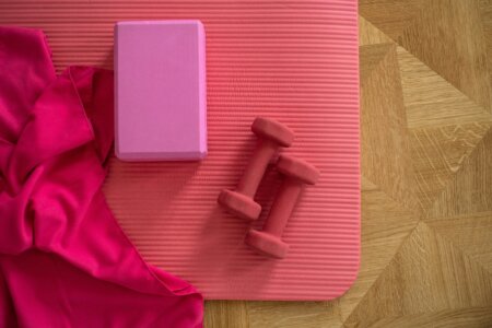 pink fitness equipment laid out on the floor